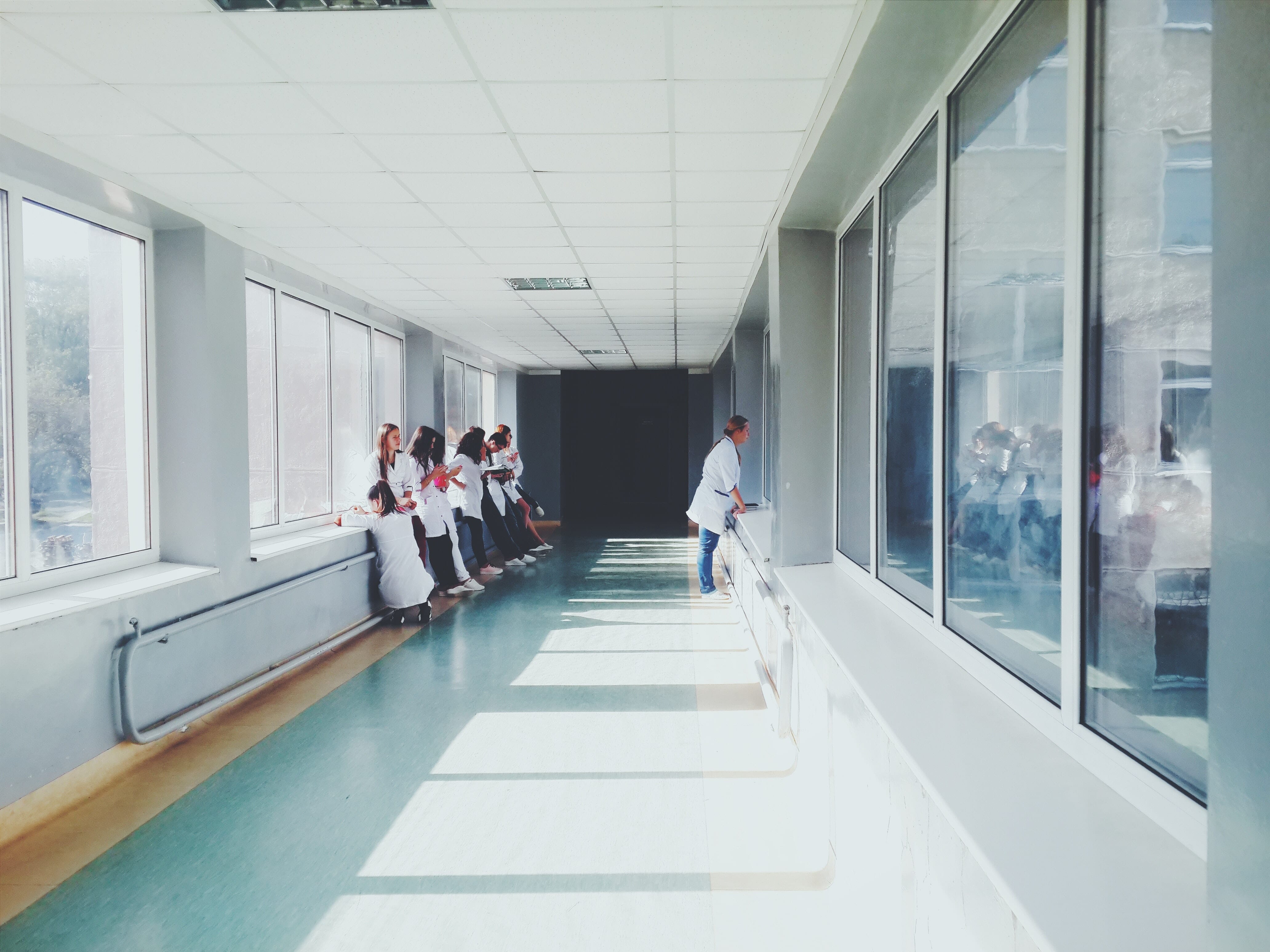 Nurses waiting in hallway of hospital