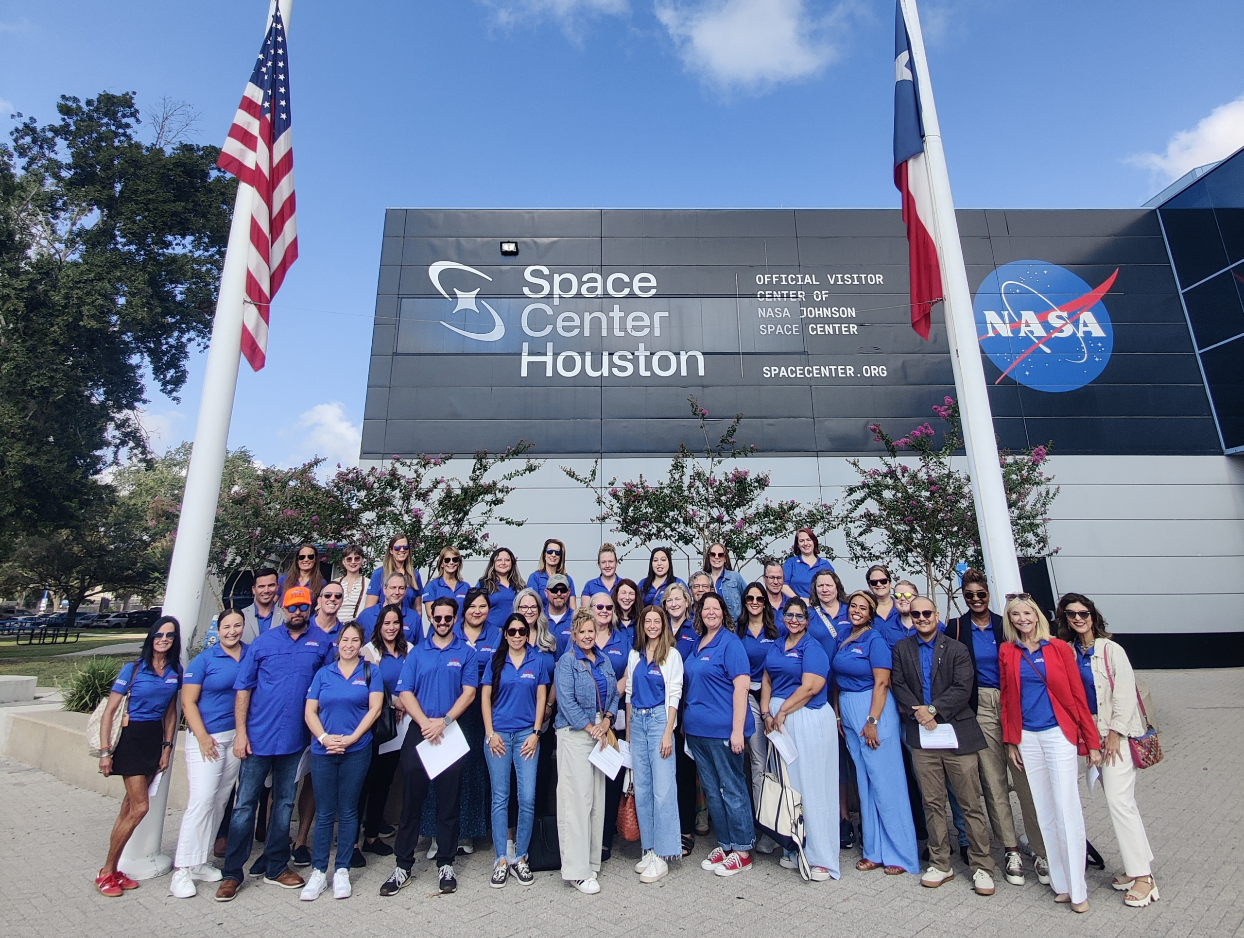 Group standing at entrance of Space Center Houston